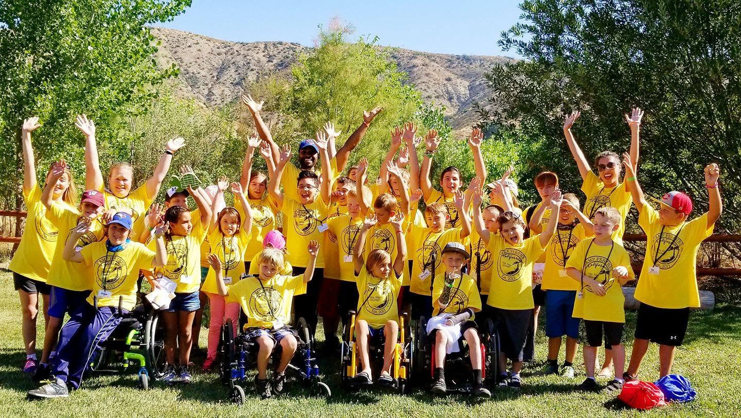PKF families together in yellow shirts